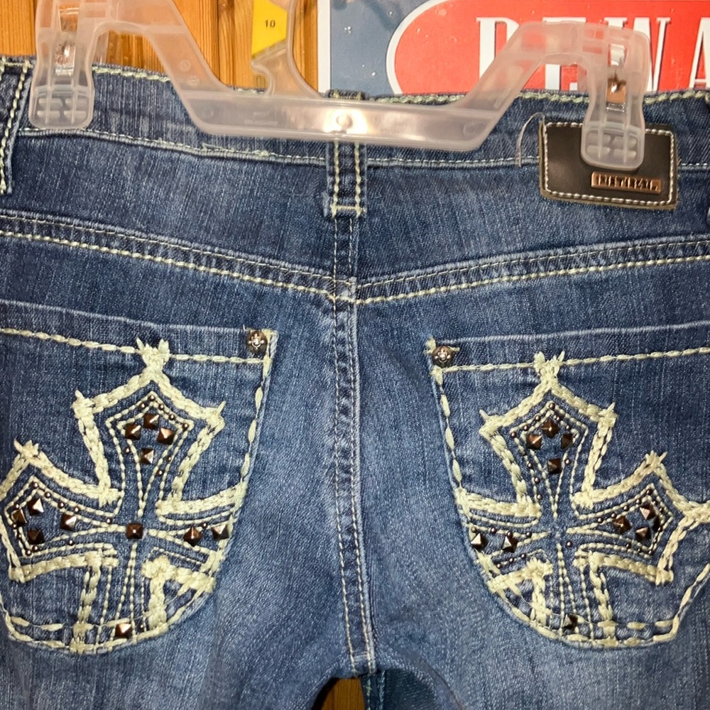 Low rise wide boot petrol women’s jeans